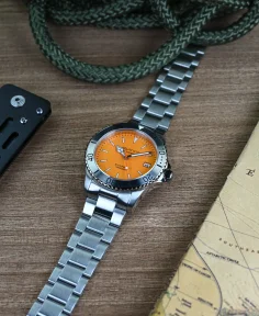 Aquatico Dolphin Orange Dial Watch